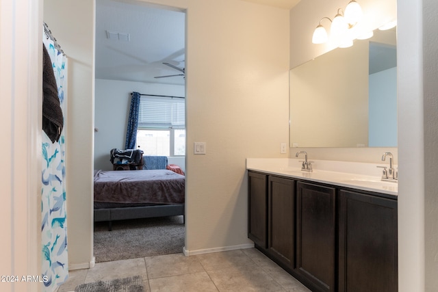 bathroom with vanity, ceiling fan, and tile patterned floors