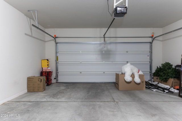 garage featuring a garage door opener