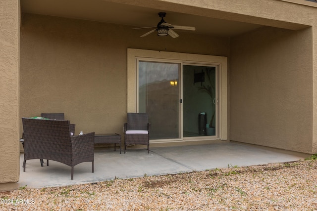 view of patio featuring ceiling fan