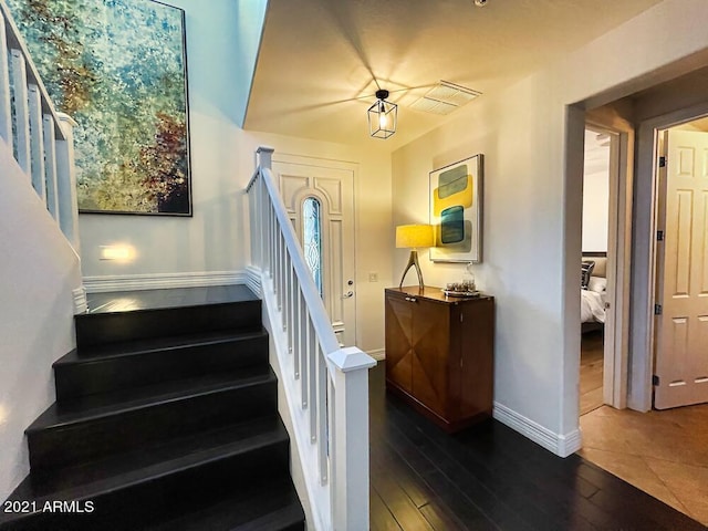 18507 N 94th St, Scottsdale, AZ 85255 - staircase featuring baseboards and wood-type flooring
