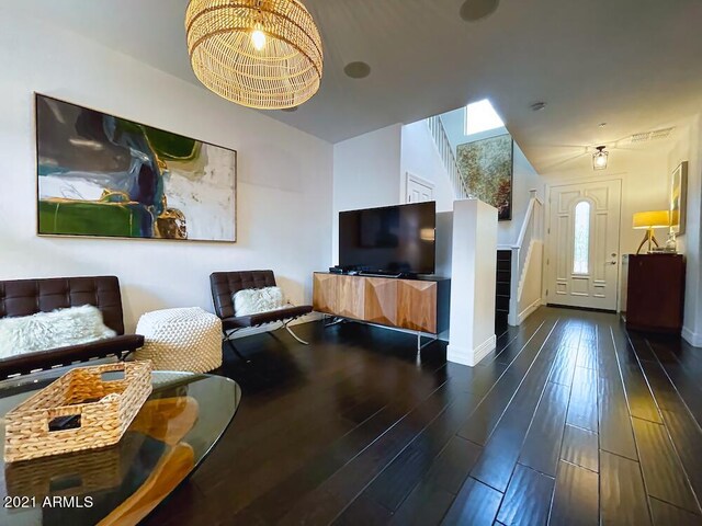18507 N 94th St, Scottsdale, AZ 85255 - living room with baseboards, visible vents, and wood finished floors