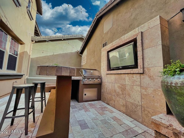 18507 N 94th St, Scottsdale, AZ 85255 - view of patio / terrace featuring area for grilling and exterior kitchen
