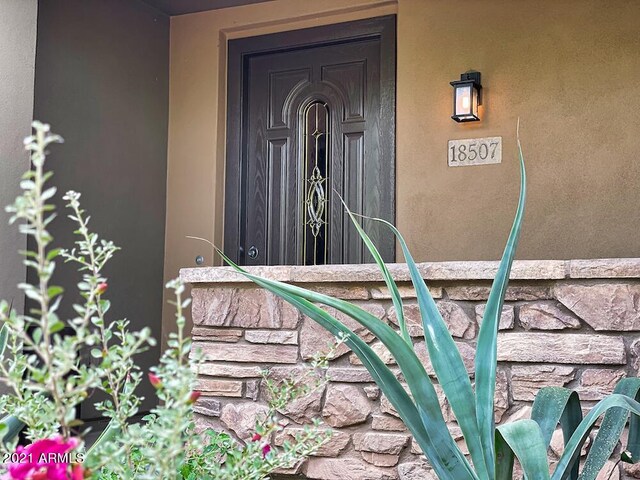 18507 N 94th St, Scottsdale, AZ 85255 - entrance to property featuring stucco siding and stone siding