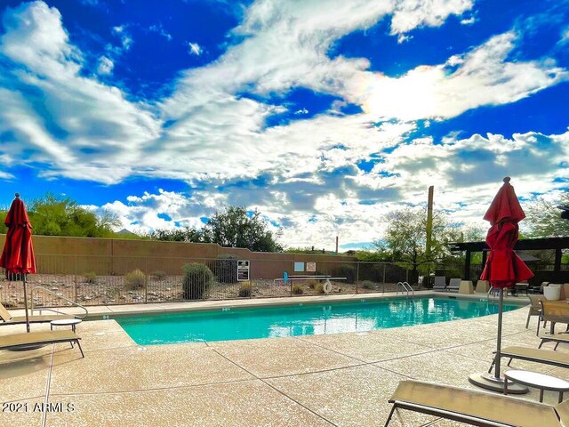 18507 N 94th St, Scottsdale, AZ 85255 - community pool with fence and a patio