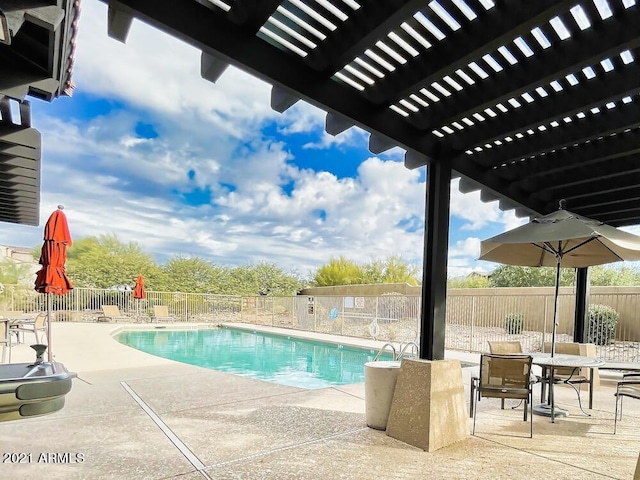 18507 N 94th St, Scottsdale, AZ 85255 - pool featuring a pergola, fence, and a patio area