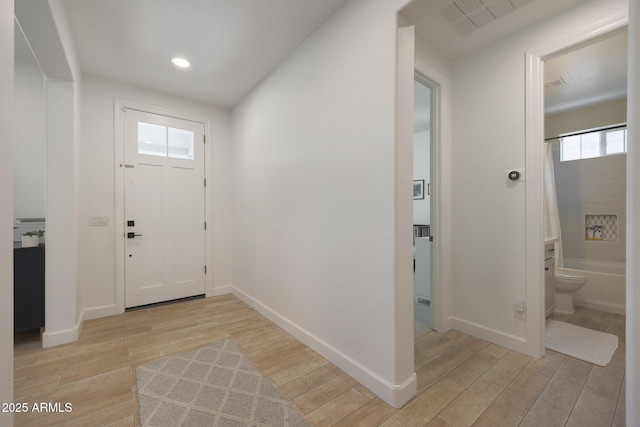 20834 W Prospector Way, Buckeye, AZ 85396 - entrance foyer with light wood-type flooring, baseboards, and recessed lighting