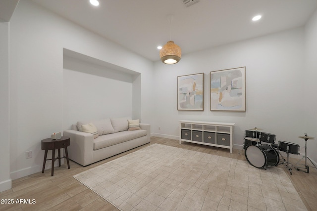20834 W Prospector Way, Buckeye, AZ 85396 - living area featuring light wood finished floors, recessed lighting, and baseboards