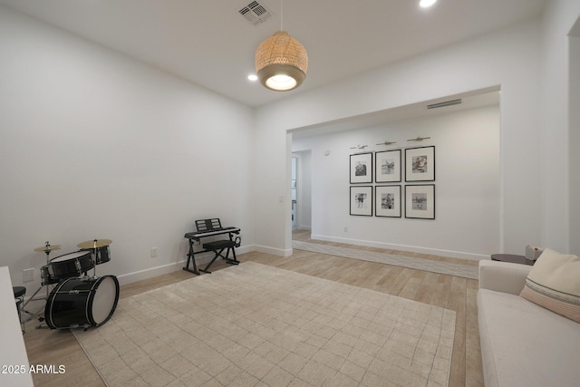 20834 W Prospector Way, Buckeye, AZ 85396 - miscellaneous room featuring light wood-style floors, recessed lighting, and baseboards