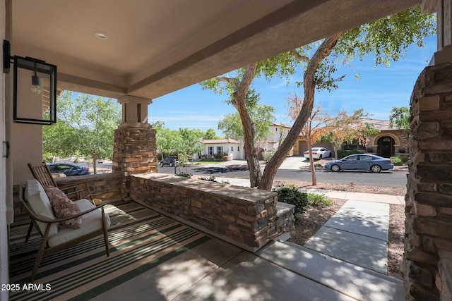 20834 W Prospector Way, Buckeye, AZ 85396 - view of patio / terrace featuring a porch