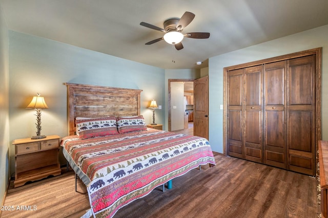 bedroom featuring a closet, ceiling fan, and wood finished floors