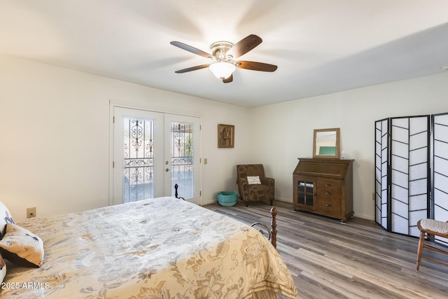 bedroom with ceiling fan, wood-type flooring, french doors, and access to outside