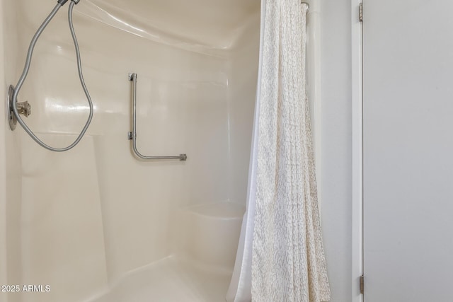 bathroom with curtained shower