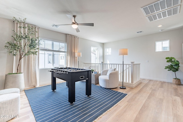 645 N Vine St, Chandler, AZ 85225 - rec room with plenty of natural light, ceiling fan, and light wood finished floors