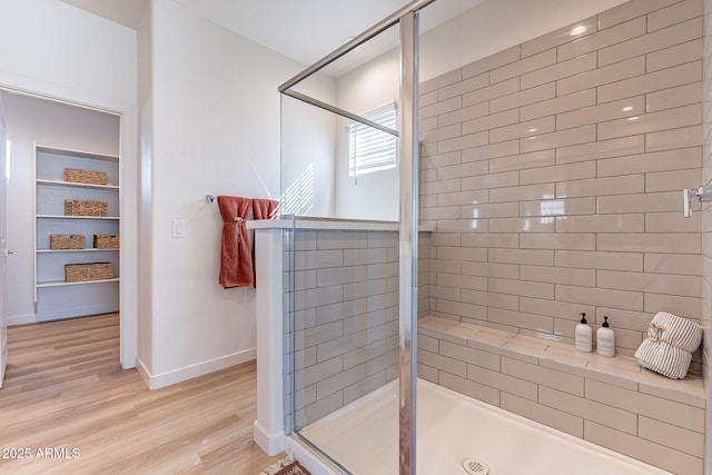 645 N Vine St, Chandler, AZ 85225 - full bathroom featuring a stall shower, baseboards, and wood finished floors