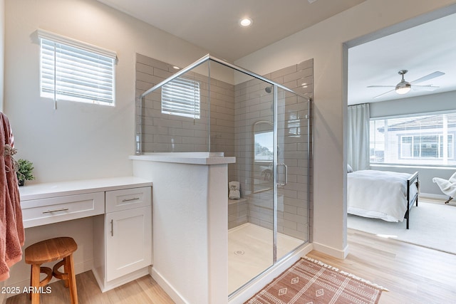 645 N Vine St, Chandler, AZ 85225 - full bath featuring wood finished floors, ensuite bath, a shower stall, recessed lighting, and ceiling fan