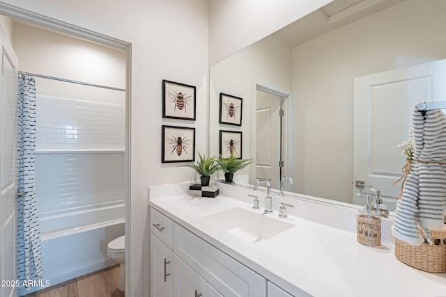 645 N Vine St, Chandler, AZ 85225 - full bathroom featuring toilet, vanity, wood finished floors, and shower / washtub combination