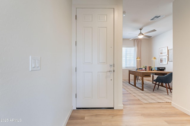 645 N Vine St, Chandler, AZ 85225 - foyer with baseboards, light wood-style flooring, and ceiling fan