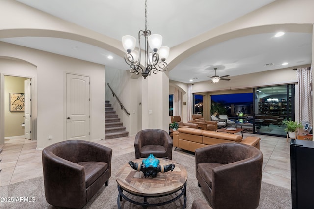 1829 N Atwood, Mesa, AZ 85207 - living area featuring visible vents, arched walkways, stairway, ceiling fan with notable chandelier, and light tile patterned flooring