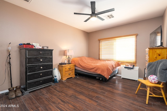 bedroom featuring dark wood-type flooring and ceiling fan