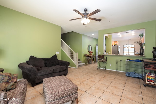 living room with tile flooring and ceiling fan