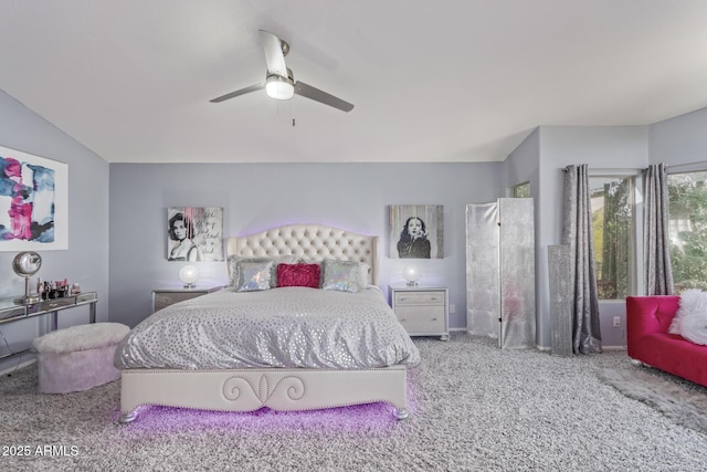 bedroom with ceiling fan and carpet floors
