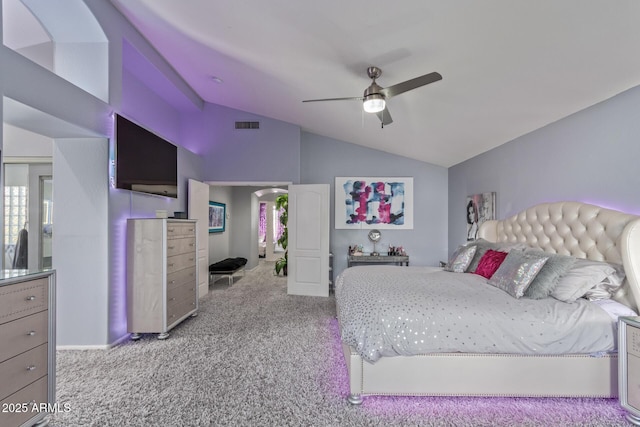 bedroom featuring carpet flooring, visible vents, ceiling fan, and lofted ceiling