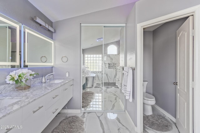 bathroom featuring a sink, baseboards, toilet, vaulted ceiling, and marble finish floor