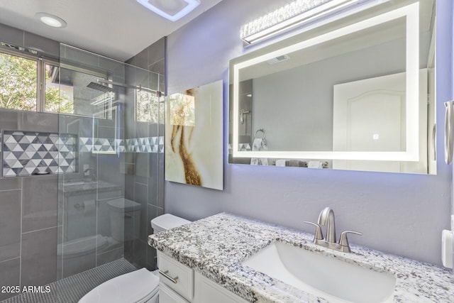 full bath featuring toilet, visible vents, a shower stall, and vanity