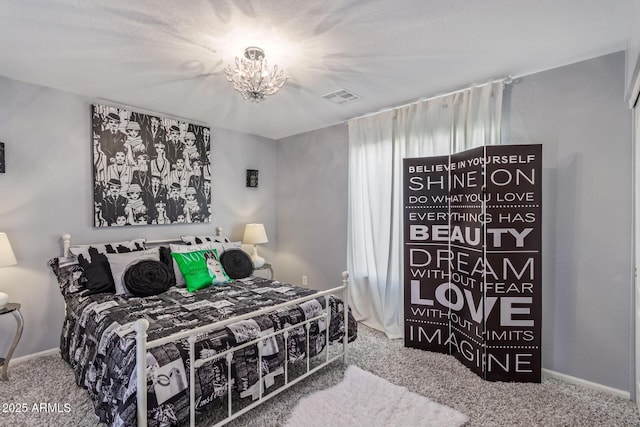 bedroom featuring carpet, visible vents, and baseboards