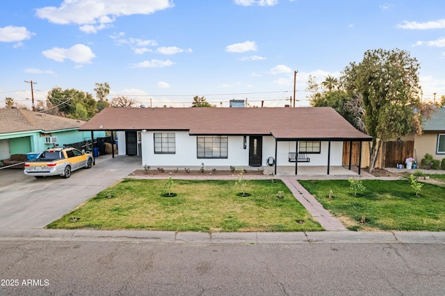 ranch-style house with a front yard