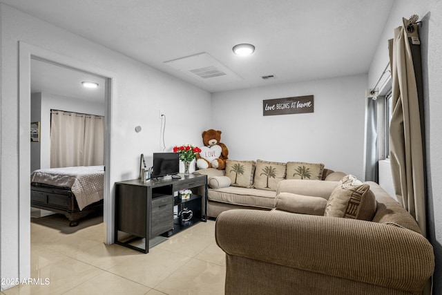 living room with light tile patterned floors