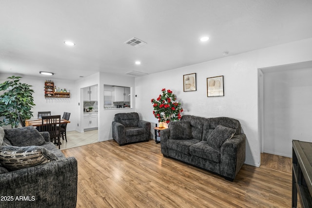 living room with hardwood / wood-style floors