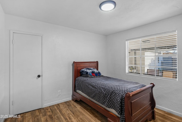 bedroom featuring hardwood / wood-style floors