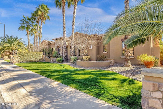 4301 E Taurus Pl, Chandler, AZ 85249 - view of front of property featuring stucco siding and a front lawn