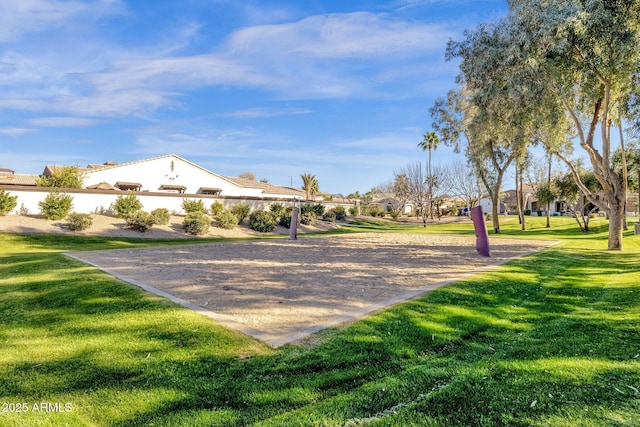 view of property's community with a lawn