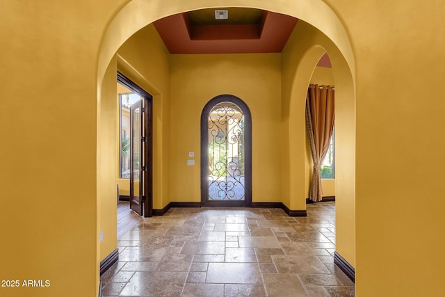 4301 E Taurus Pl, Chandler, AZ 85249 - foyer entrance with stone tile flooring and a towering ceiling