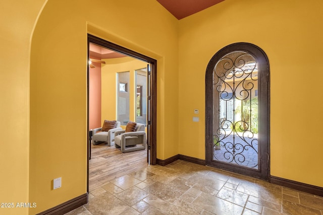 4301 E Taurus Pl, Chandler, AZ 85249 - foyer with arched walkways and stone tile flooring
