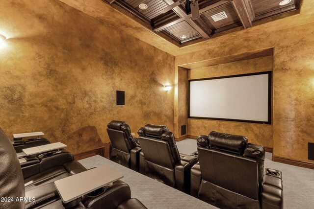 carpeted home theater featuring wood ceiling, beam ceiling, coffered ceiling, and baseboards