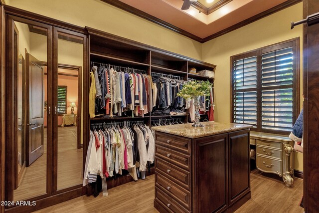 spacious closet featuring wood finished floors