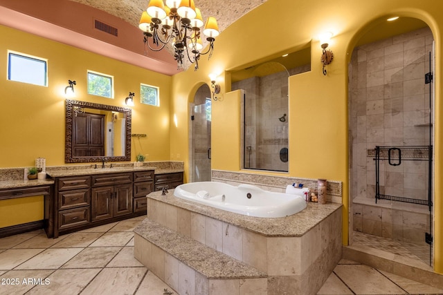 4301 E Taurus Pl, Chandler, AZ 85249 - full bathroom with a stall shower, vanity, a tub with jets, a chandelier, and tile patterned floors