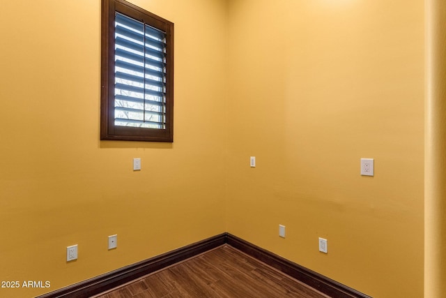 4301 E Taurus Pl, Chandler, AZ 85249 - spare room with baseboards and dark wood-style flooring