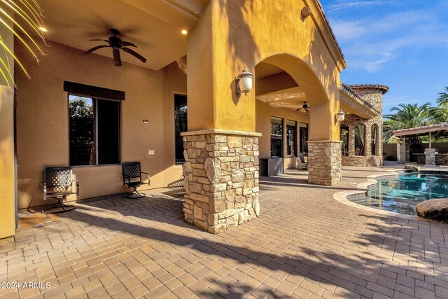 view of patio with ceiling fan