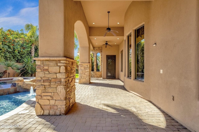 4301 E Taurus Pl, Chandler, AZ 85249 - view of patio featuring a ceiling fan and a pool with connected hot tub