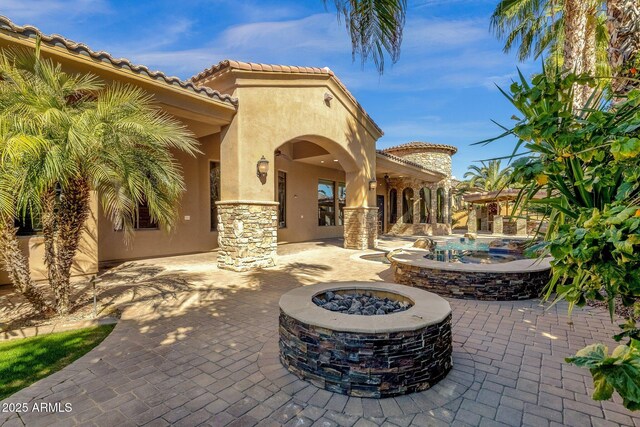 4301 E Taurus Pl, Chandler, AZ 85249 - view of patio featuring an outdoor fire pit