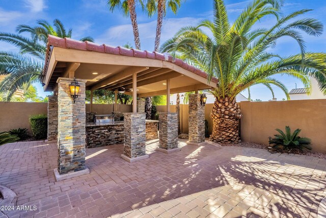 view of patio / terrace featuring area for grilling and fence private yard