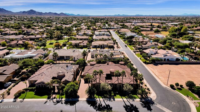 drone / aerial view featuring a mountain view and a residential view