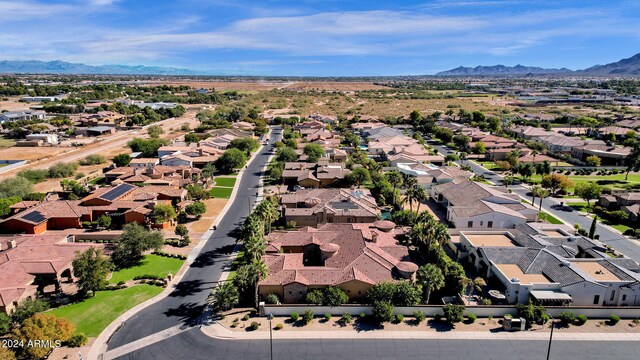 birds eye view of property with a residential view and a mountain view