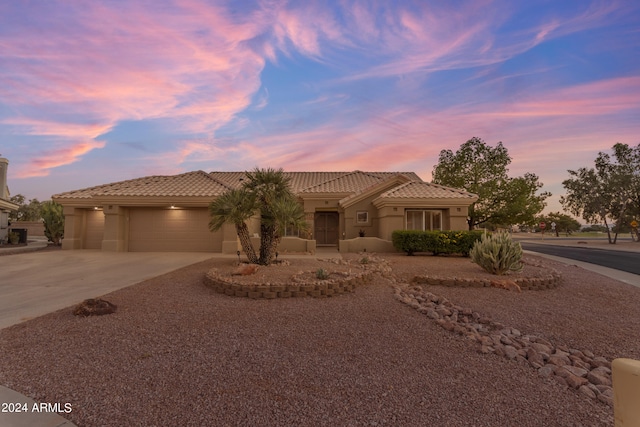 view of front of home with a garage