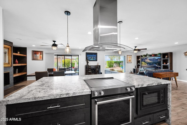 8730 E Montecito Ave, Scottsdale, AZ 85251 - kitchen with open floor plan, a ceiling fan, stainless steel electric stove, dark cabinets, and recessed lighting