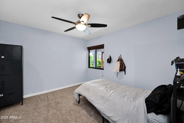 8730 E Montecito Ave, Scottsdale, AZ 85251 - carpeted bedroom with baseboards and a ceiling fan